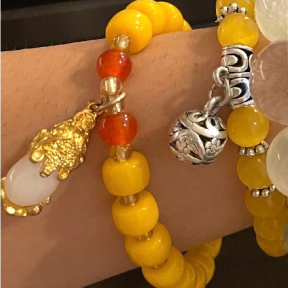 Yellow and Orange Beaded Bracelet with Charms